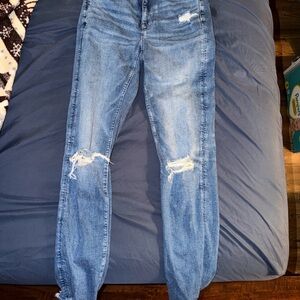 Distressed women’s American Eagle Blue Jeans
